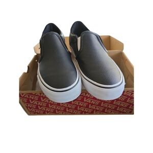 Vans Black and White Classic Slip-On Sneakers